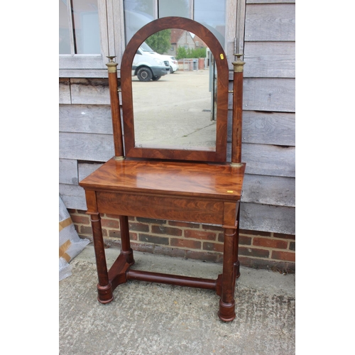 449 - A Biedermeier figured mahogany dressing table with arch top mirror, over single drawer, on turned su... 