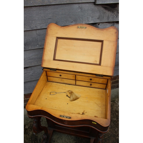 452 - A Victorian figured walnut Davenport with stationery compartment over lift-up writing slope and four... 