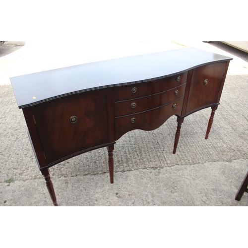 522 - A mahogany dining room suite comprising extending table, 86