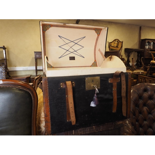 594 - An early 20th century canvas and leather dome top trunk, 24