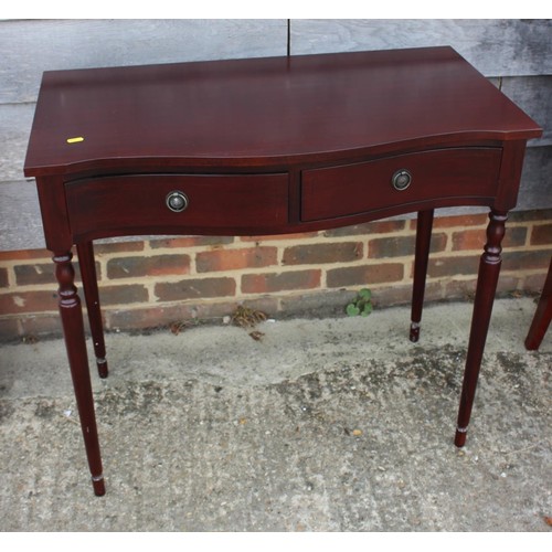 526 - A mahogany oval drop leaf table, fitted one deep drawer, on tapering supports, 36