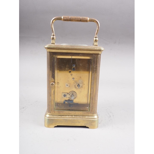 107 - A French brass cased carriage clock with white enamel dial and Roman numerals, 5