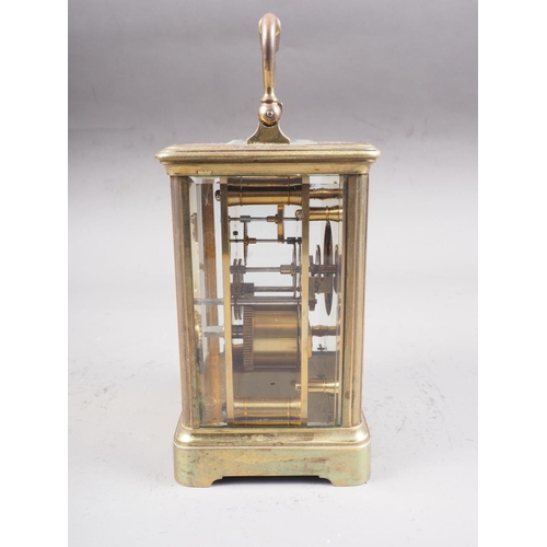 107 - A French brass cased carriage clock with white enamel dial and Roman numerals, 5