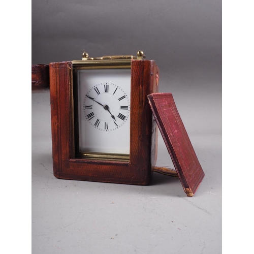 107 - A French brass cased carriage clock with white enamel dial and Roman numerals, 5