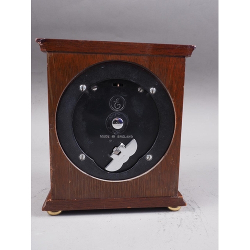 115 - An Elliot of London mahogany cased mantel clock, on ball feet, 6