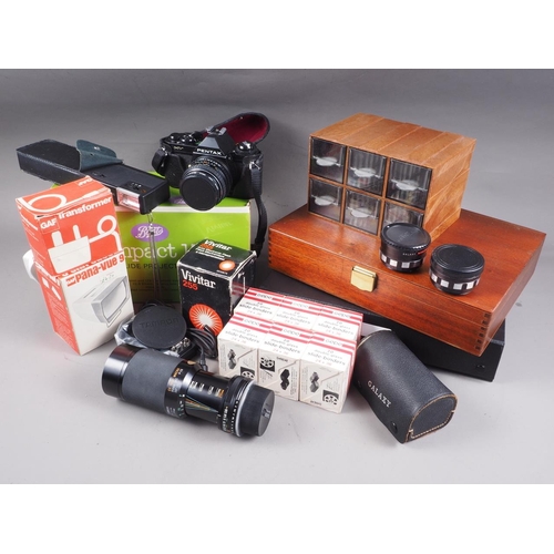 117 - A Pentax MV camera in travelling case, a quantity of double glass slide binders, a Tamron 80-210 len... 