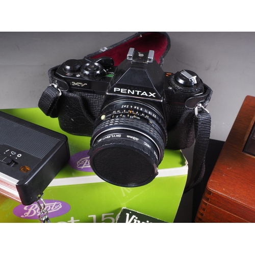 117 - A Pentax MV camera in travelling case, a quantity of double glass slide binders, a Tamron 80-210 len... 