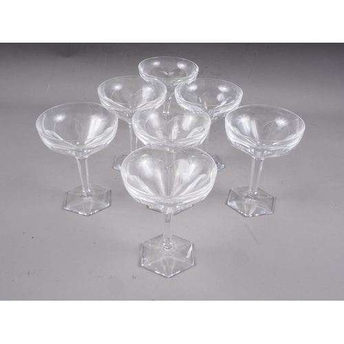 13 - Seven French? Art Deco faceted glass champagne coupes, on hexagonal bases, 5 1/2