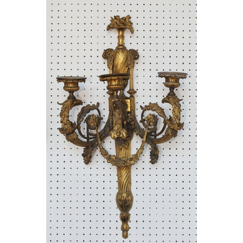 152 - A pair of late 18th century ormolu three-branch wall lights with eagle heads, acanthus scrolls and s... 