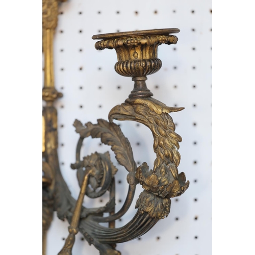 152 - A pair of late 18th century ormolu three-branch wall lights with eagle heads, acanthus scrolls and s... 