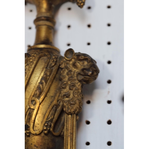 152 - A pair of late 18th century ormolu three-branch wall lights with eagle heads, acanthus scrolls and s... 