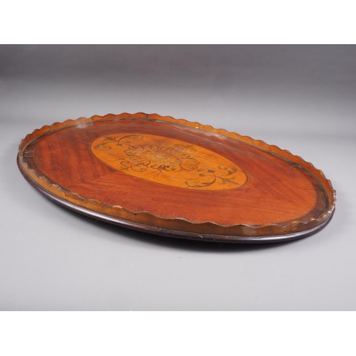 164 - A mahogany banded and satinwood inlaid oval gallery tray, 29