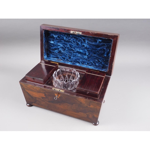 170 - A rosewood sarcophagus two-section tea caddy with glass mixing bowl, on bun feet, 12 1/2