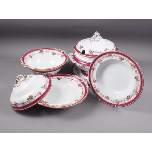 19 - A Copeland part dinner service with brown transfer decorated order and wine red edge, comprising sou... 