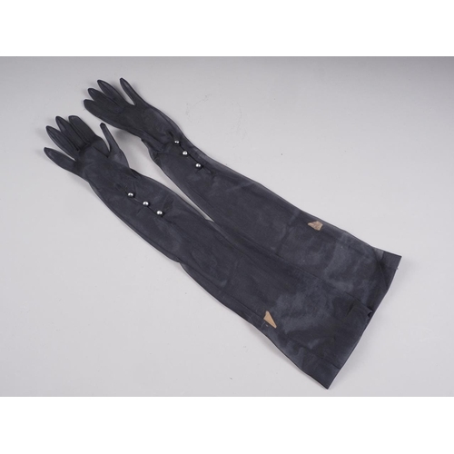 193 - A pair of 1920s Pinkham & Son England black nylon arm length gloves