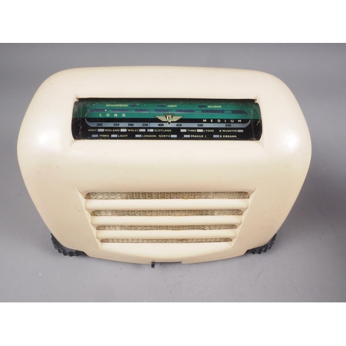 200 - A Kolster-Brandes Ltd cream Bakelite cased AC mains radio and a brown Bakelite cased portable radio