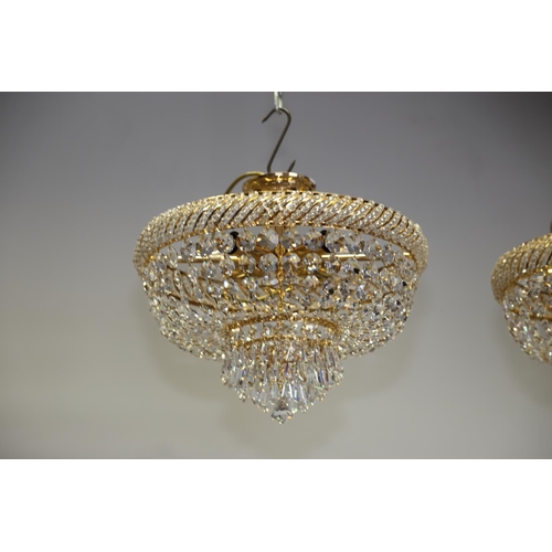 231 - A cut glass bag chandelier with gilt metal frame and pendant spear point drops, 15