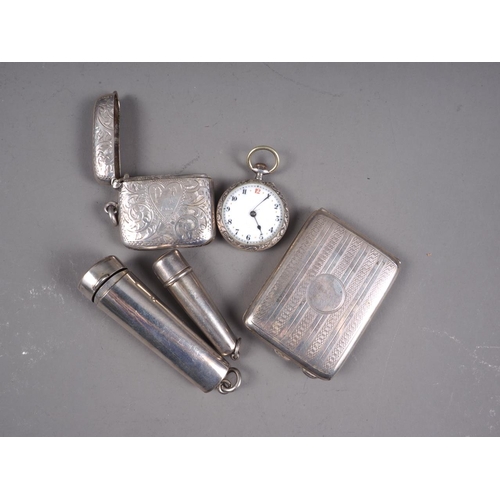 266 - A silver book match case, a silver vesta case, a silver cased fob watch and two silver cheroot holde... 