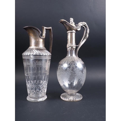 276 - A late 19th century silver mounted claret jug with shell engraved decoration, 11 1/2