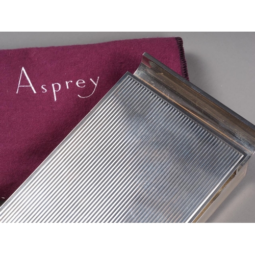 292 - An Asprey silver desk top note pad holder