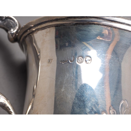 294 - A Victorian silver mug with engraved and initialled decoration, 3 1/2