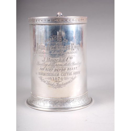 297 - A Victorian silver presentation tankard with engraved decoration, 4 3/4