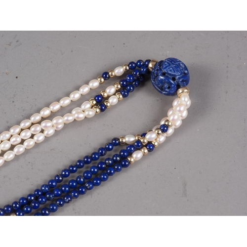 306 - A lapis, cultured pearl and gilt bead necklace