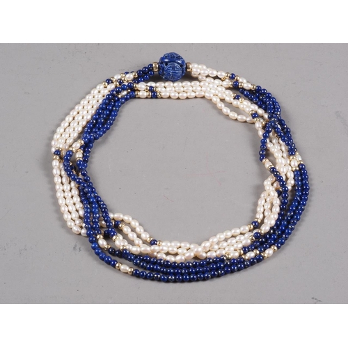 306 - A lapis, cultured pearl and gilt bead necklace