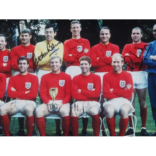 341 - A 1966 England World Cup team part signed photograph, Ray Wilson, Gordon Banks, George Cohen and oth... 