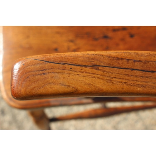 417 - A 19th century cherrywood Oxford bar back elbow chair, on turned supports