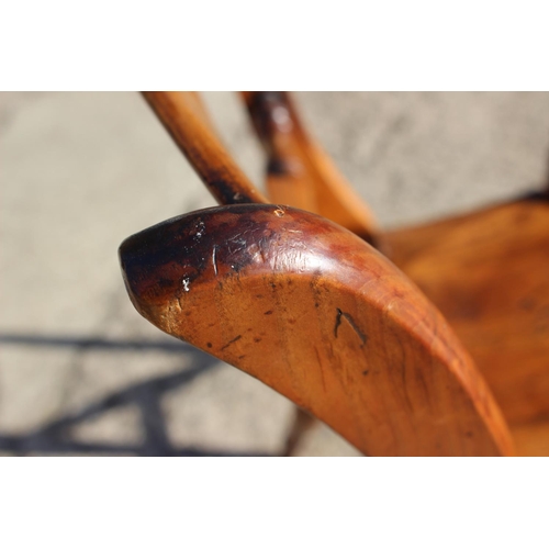 417 - A 19th century cherrywood Oxford bar back elbow chair, on turned supports