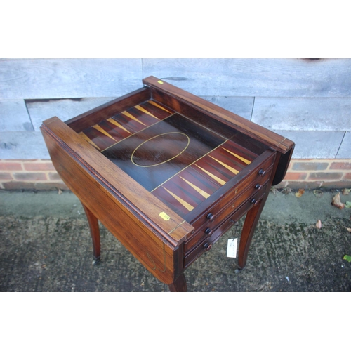 434 - A Regency rosewood and brass line inlaid work and games table, fitted reversible chess board, backga... 