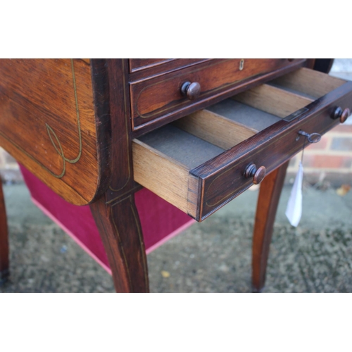 434 - A Regency rosewood and brass line inlaid work and games table, fitted reversible chess board, backga... 