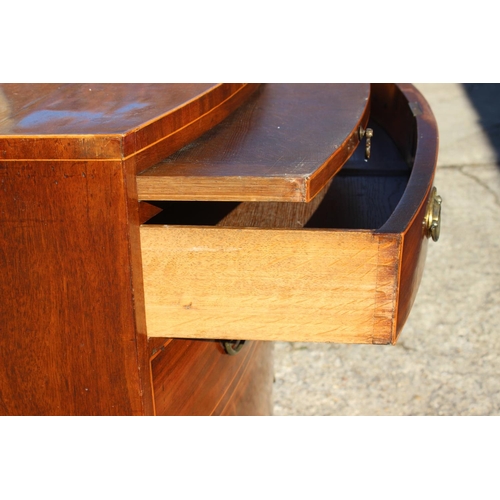 440 - A bachelor's Georgian mahogany box line inlaid bowfront chest of four long graduated drawers with ov... 