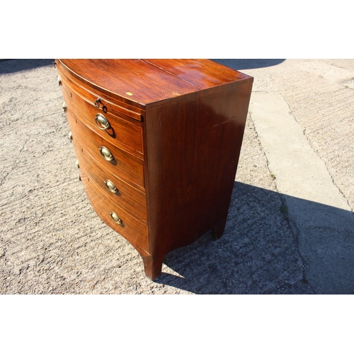 440 - A bachelor's Georgian mahogany box line inlaid bowfront chest of four long graduated drawers with ov... 