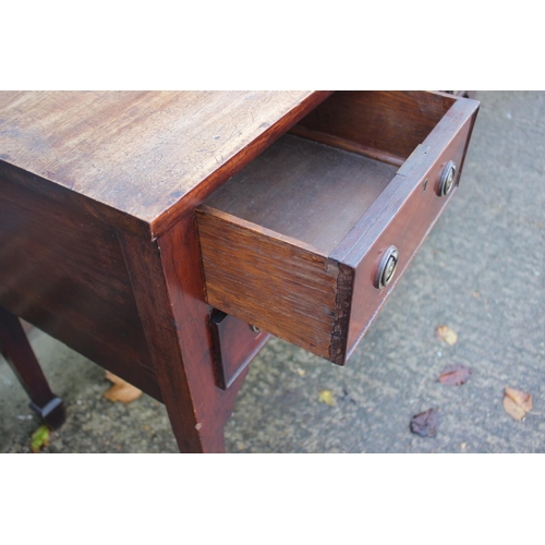 460 - A 19th century mahogany kneehole desk, fitted five drawers with brass ring handles, on square taper ... 