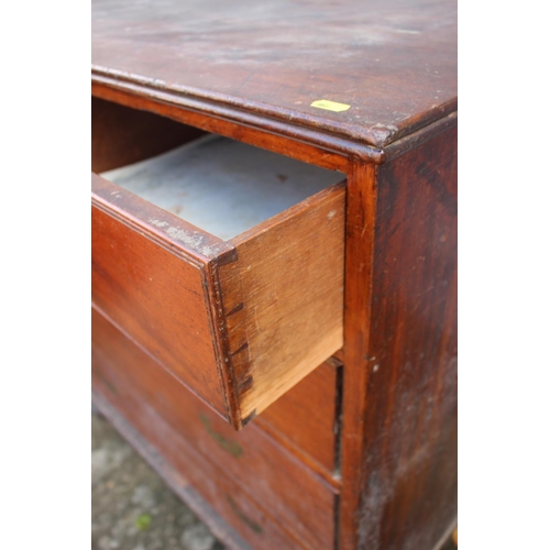 466 - A late 19th century mahogany chest of two short and three long drawers with inset brass handles, on ... 