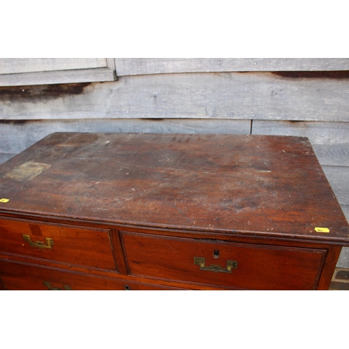 466 - A late 19th century mahogany chest of two short and three long drawers with inset brass handles, on ... 