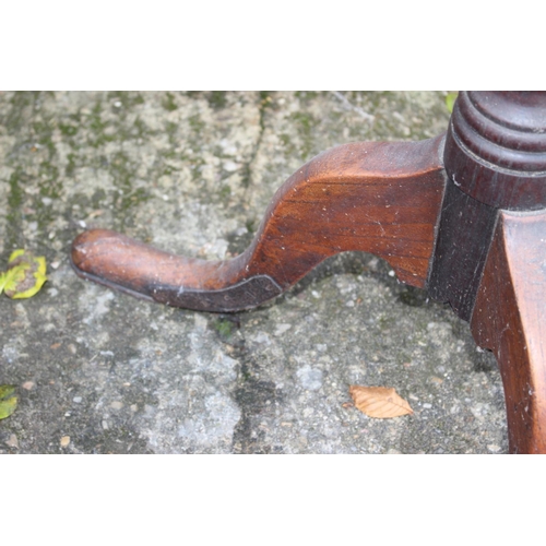 469 - A 19th century provincial oak circular top occasional table, on vase turned column and tripod splay ... 