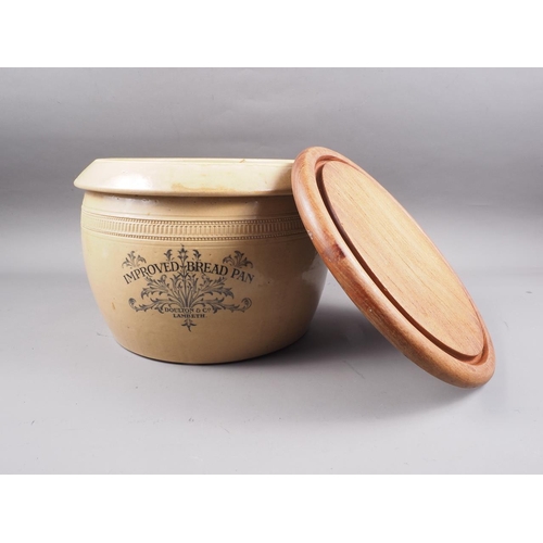 47 - A Doulton Lambeth bread crock with matched lid, 8 1/2