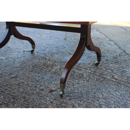 503 - A mahogany and tooled leather lined low coffee table, on splay supports, 41 1/2