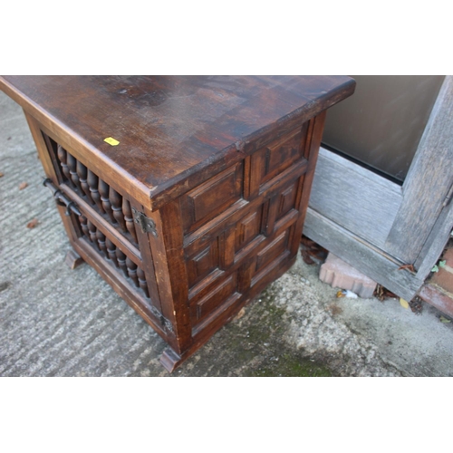 504 - A mid 20th century hardwood spindle fronted cupboard, 24