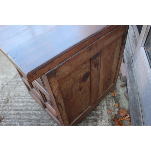 504 - A mid 20th century hardwood spindle fronted cupboard, 24