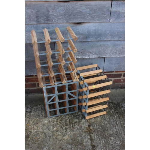 506 - Seven wood and metal twelve-bottle wine racks