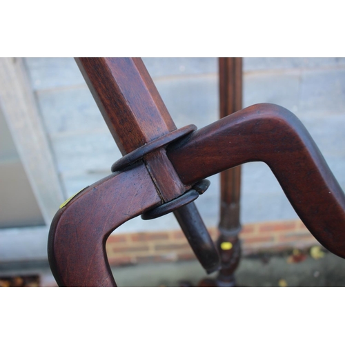 519 - A carved mahogany fluted standard lamp, on tripod splay support, 60