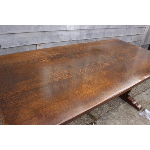 540 - An oak refectory dining table with planked top, on turned supports, 79 1/2