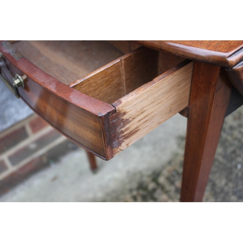 566 - An Edwardian mahogany oval Pembroke table, fitted one drawer, on square taper supports, 29