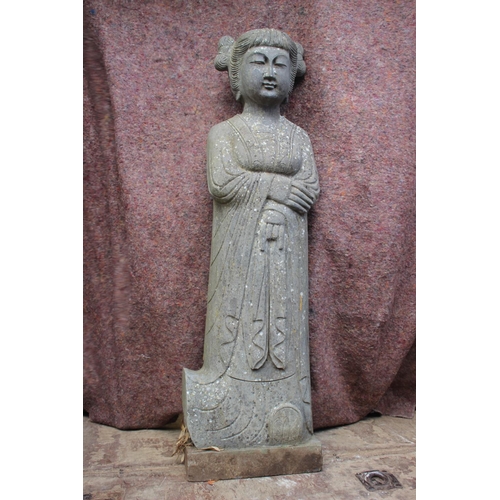 601 - A pair of Chinese carved sandstone statues, female figures in Tang costume, 47