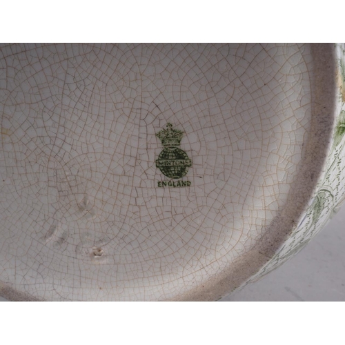 61 - A Minton floral decorated jardiniere, 8 1/4