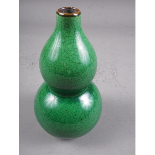 85 - A Chinese porcelain green crackle glazed double gourd vase, 6